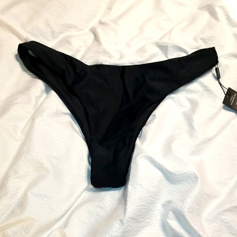 NWT OCEAN BLUE TANGA SWIM BOTTOM SIZE LARGE